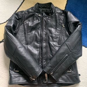 Women leather biker jacket with removable insert.